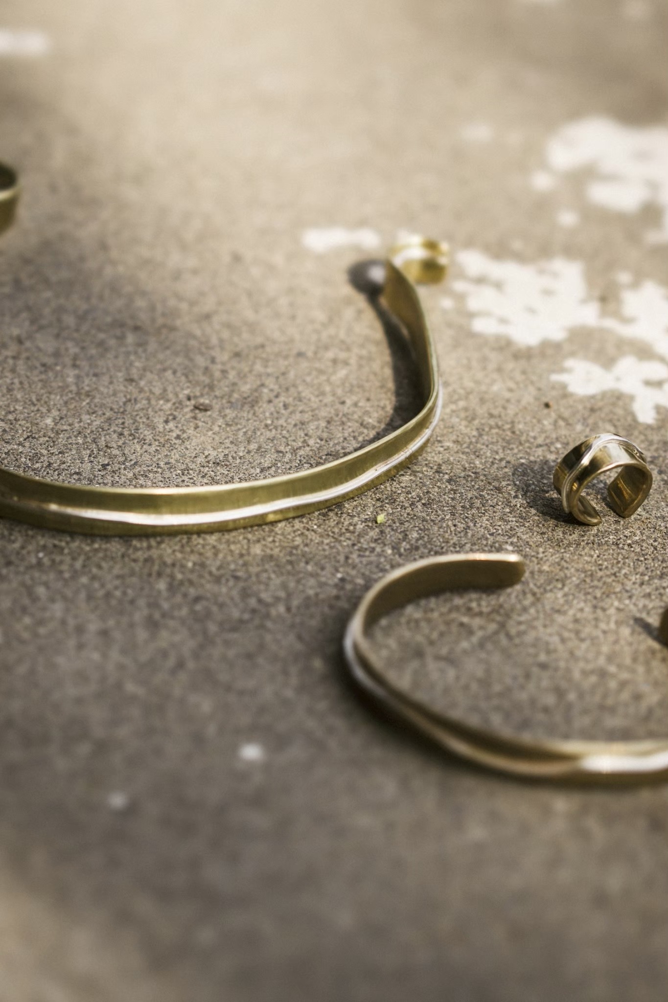 Brass cuffs and rings