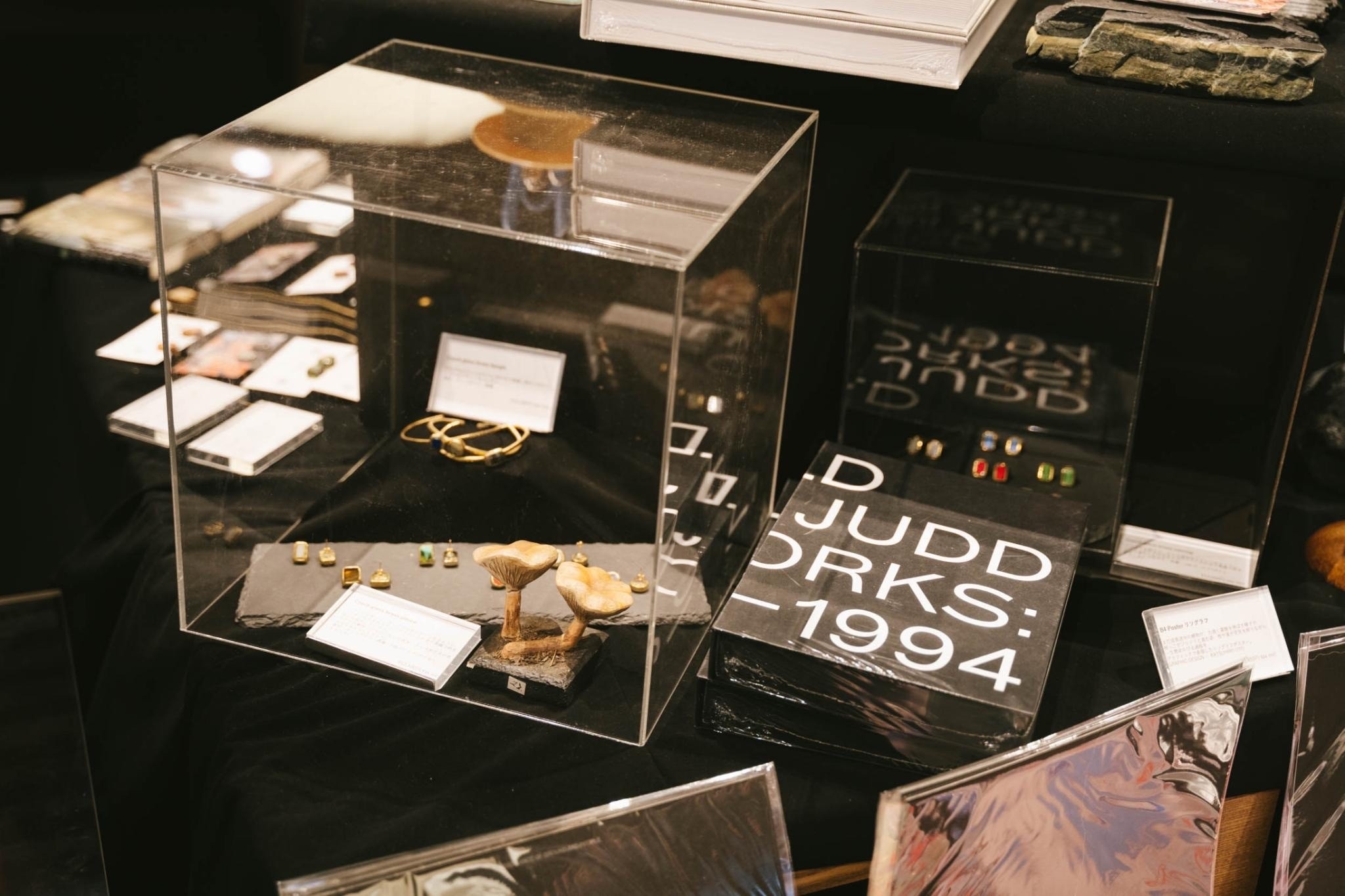 Jewelry spread with curated books