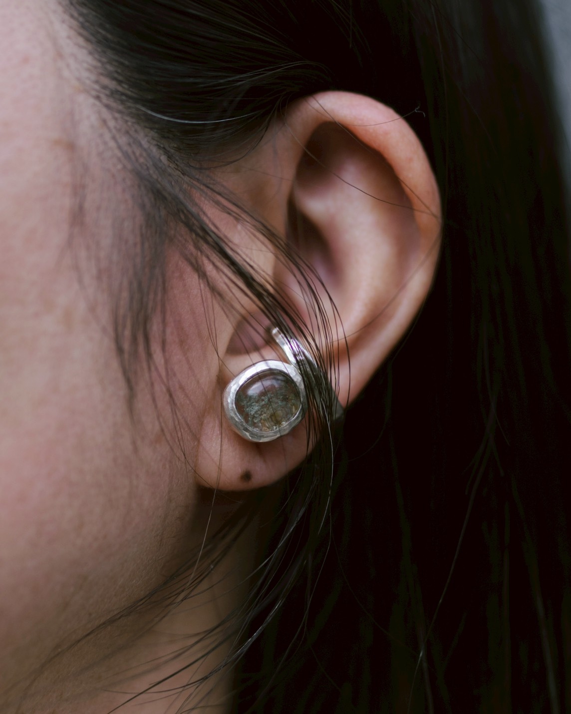 Stone ear cuff, worn